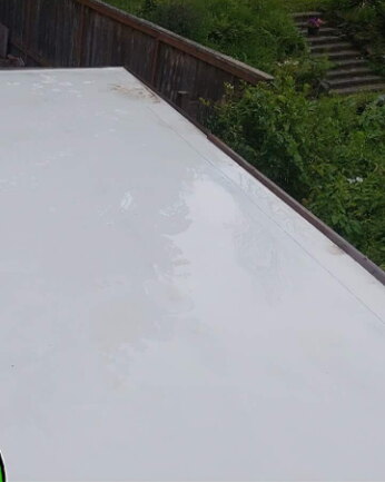 Same flat roof clean after washing