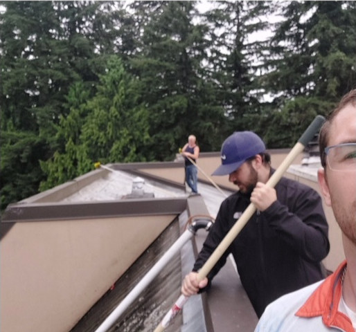 Deep Water technicians cleaning gutters on a Fremont home